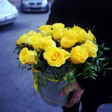 Box with yellow roses